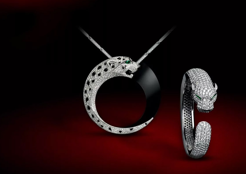 кольцо с ягуаром cartier и подвеска с драгоценными камнями